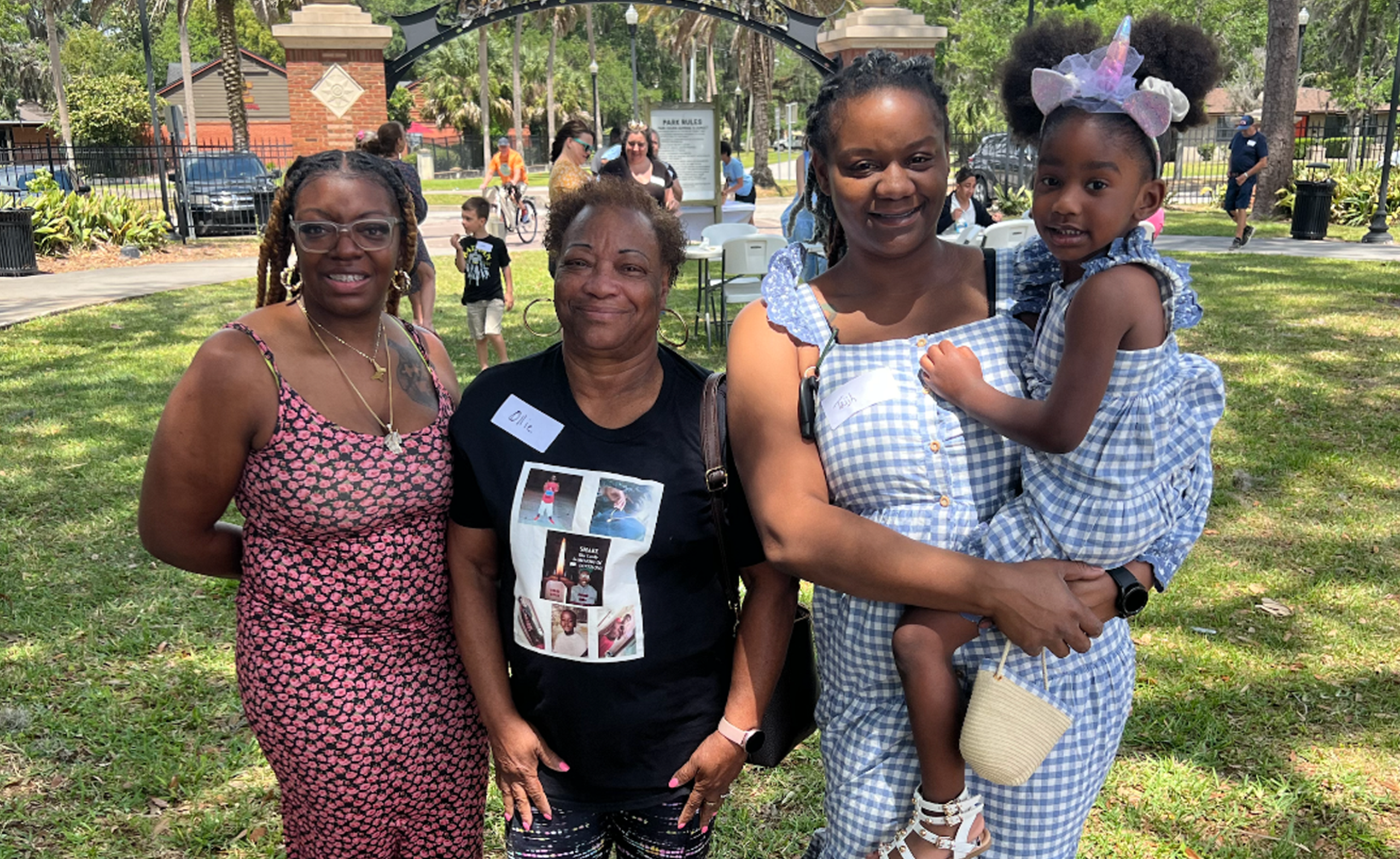 imgi_4_20250328_114256-scaled_0002_imgi_15_an-Angel-family-at-a-memorial-event